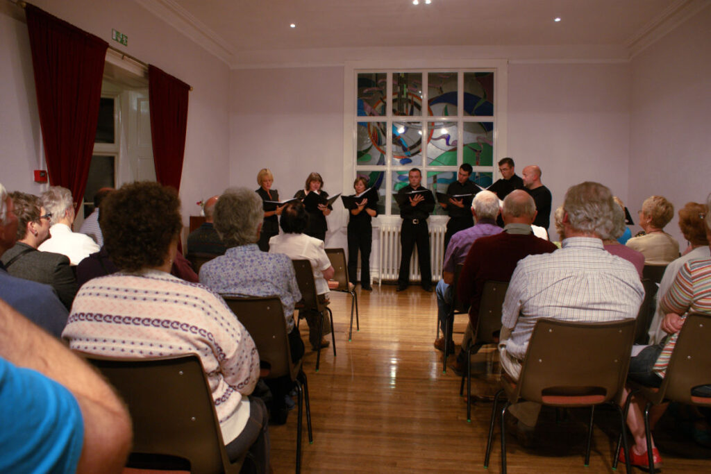 Group singing at Dunfield House