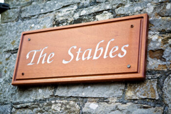 The Stables sign