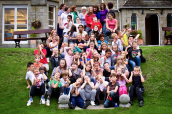 School group posing for a photo at Dunfield House