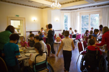 School group at Dunfield House in the dining room